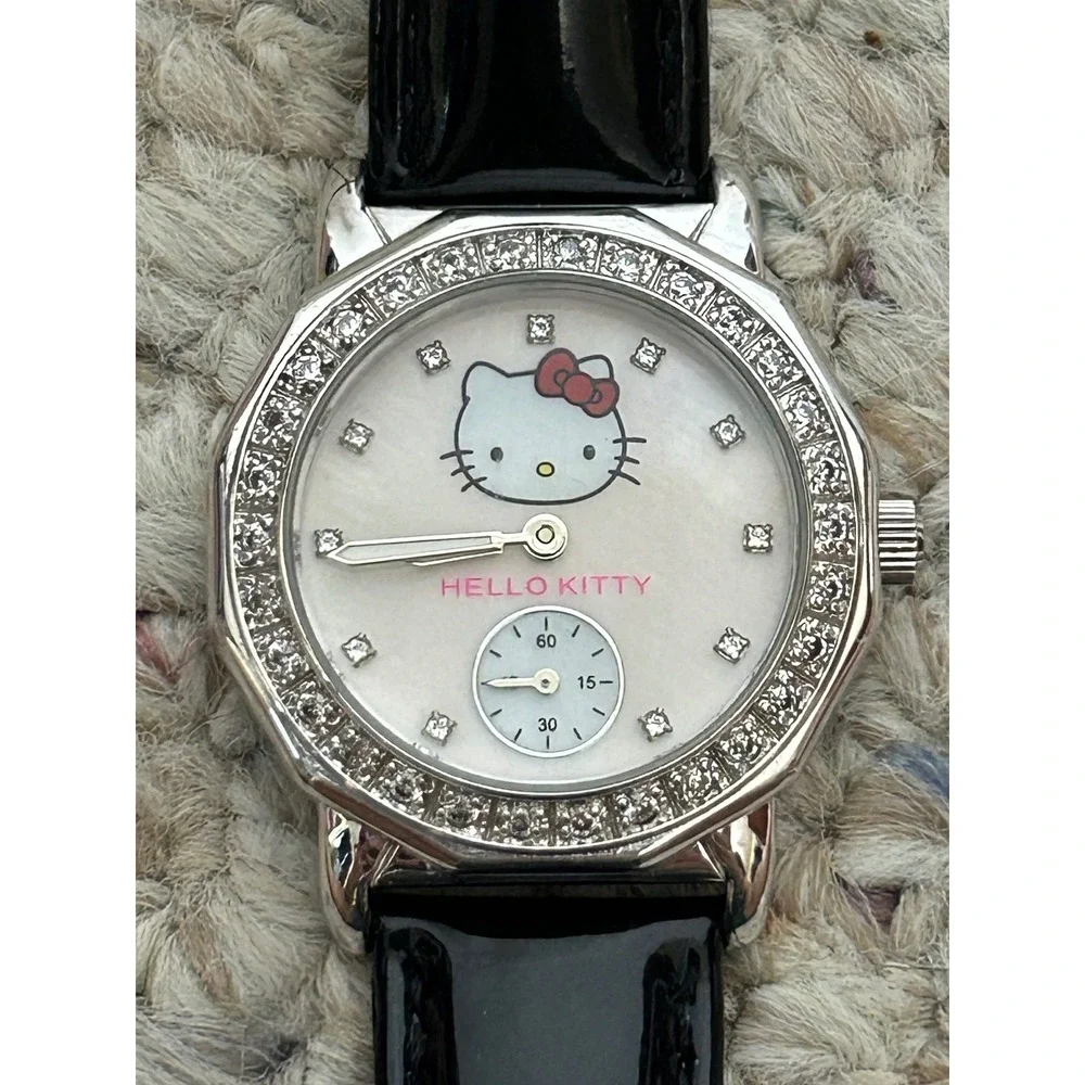 Hello Kitty Women's Watch Silver Tone Rhinestone Bezel‎ Black Band